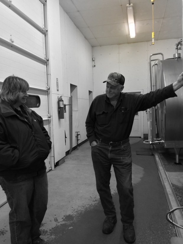 Clark's Milk Transport is a family business and a family farm. Driver Karen Clark gets a moment to chat with Dad, Butch, at the first stop of the day, Flood Brothers Farm, where Karen takes the loaded truck to H.P. Hood in Portland, Maine and Butch will fill up the other truck with fresh, local, milk. 